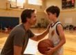 parent talking to young athlete after game with supportive encouragement